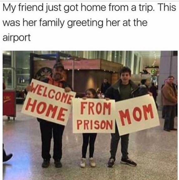 My friend just got home from a trip. this was her family greeting her at the air