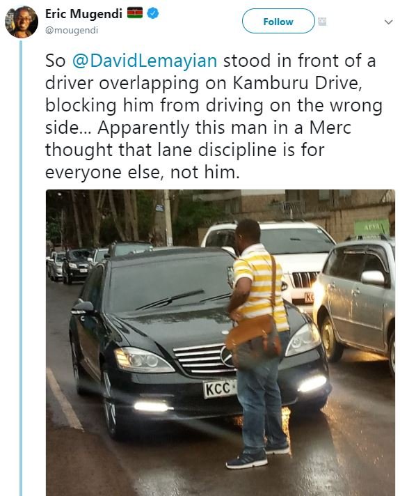 Eric mugendi mougendi follow so davidlemayian stood in front of a driver overlap