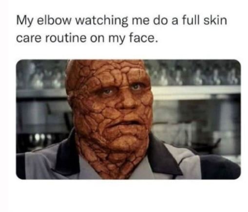 My elbow watching me do a full skin care routine on my face