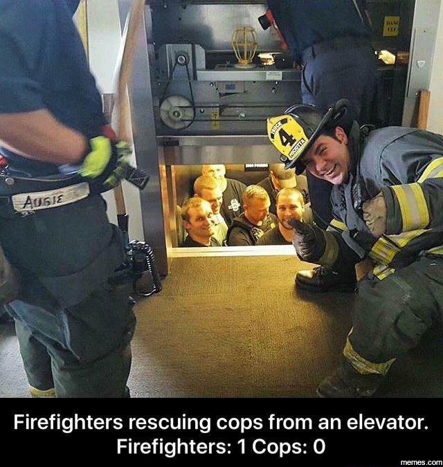 Ausue firefighters rescuing cops from an elevator. firefighters 1 cops 0 memes c