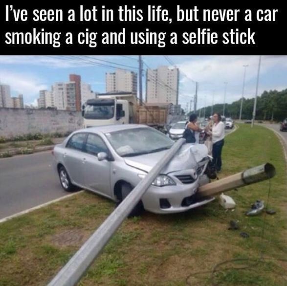 Yve seen a lot in this life, but never a car smoking a cig and using a selfie st