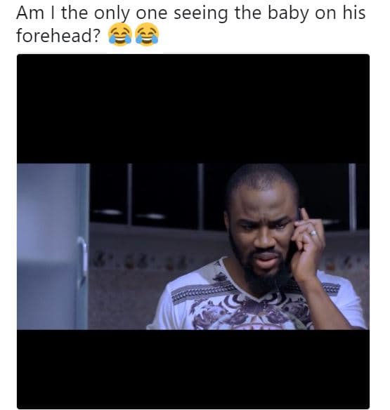 Am the only one seeing the baby on his forehead?