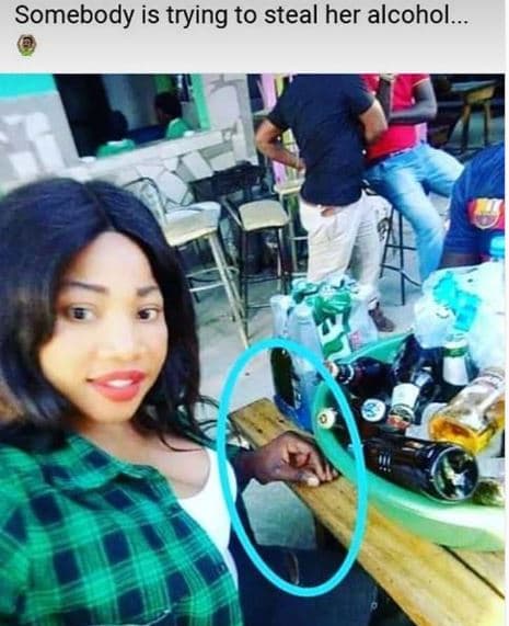 Somebody is trying to steal her alcohol.