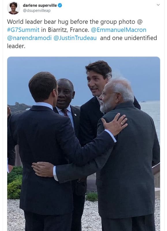 Darlene superville dsupervilleap world leader bear hug before the group photo g7