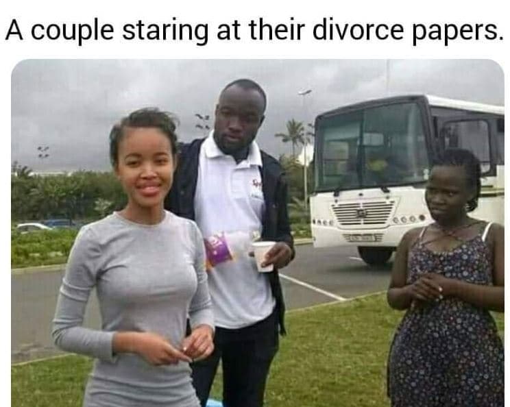 A couple staring at their divorce papers.