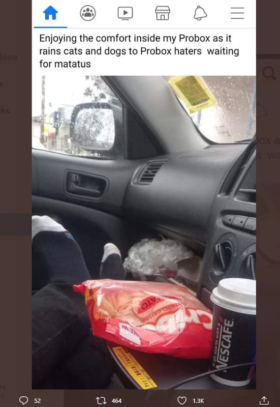 Enjoying the comfort inside my probox as it rains cats and dogs to probox haters