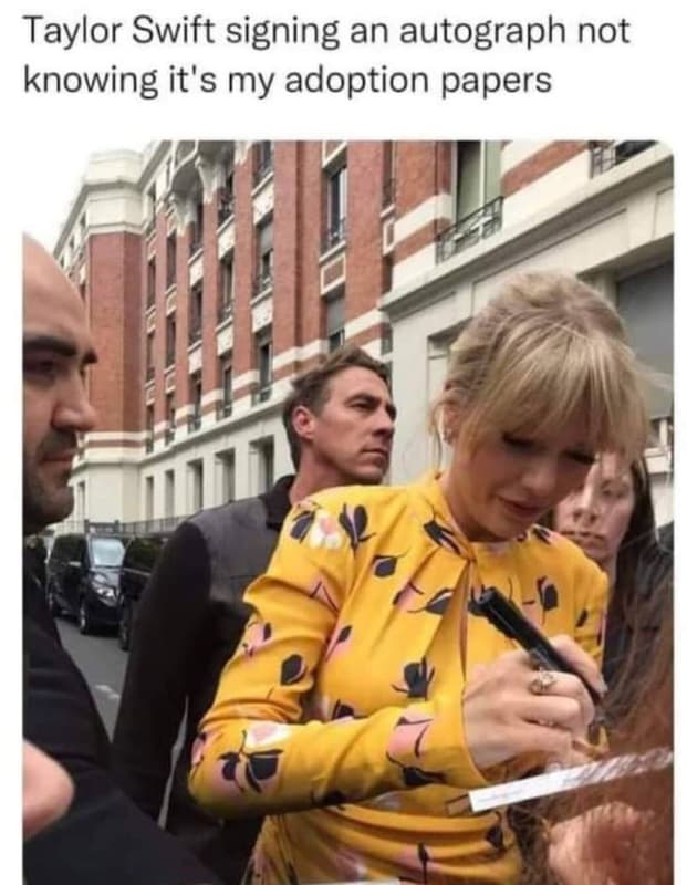 Taylor swift signing an autograph not knowing it's my adoption papers